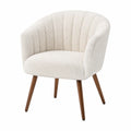 Poltrona imbottita con schienale avvolgente in tessuto bouclé beige chiaro e gambe in legno naturale 72x70x78 cm